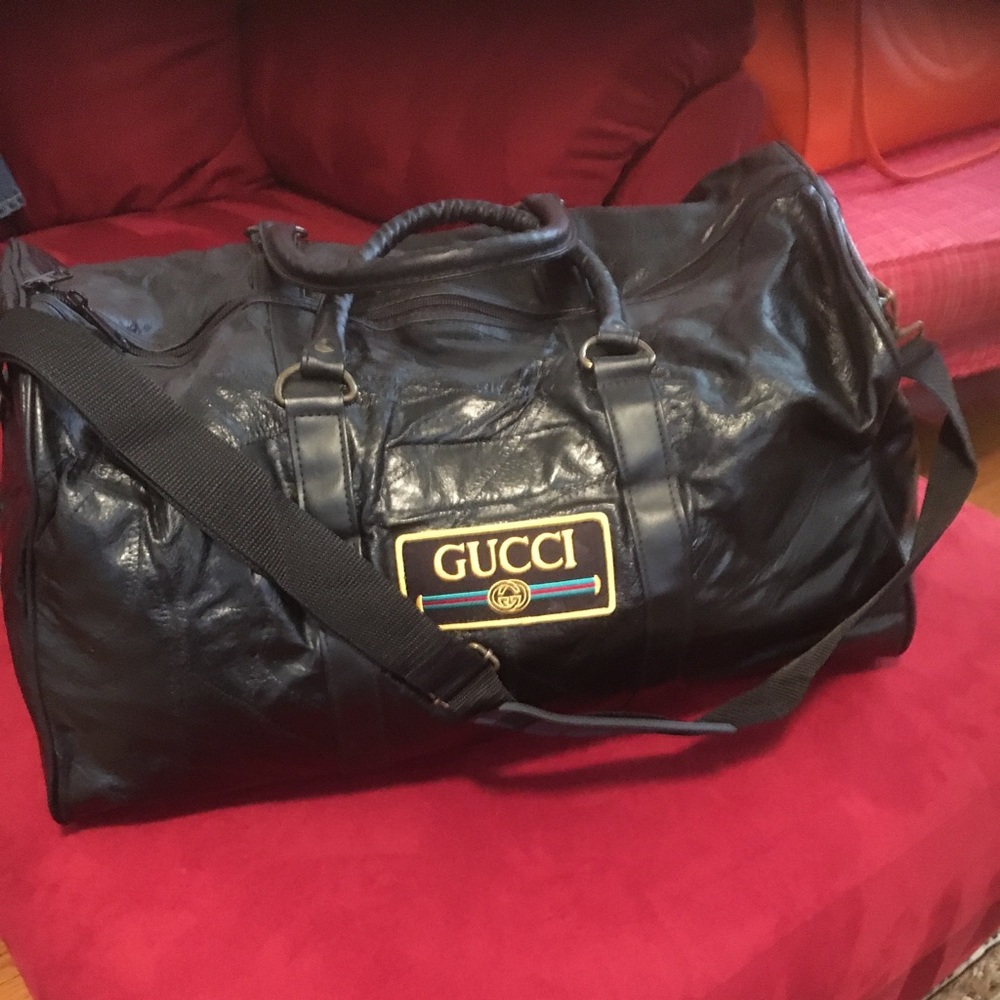 Customized duffel bag. See photos. I have NO history on this bag. Closet find.